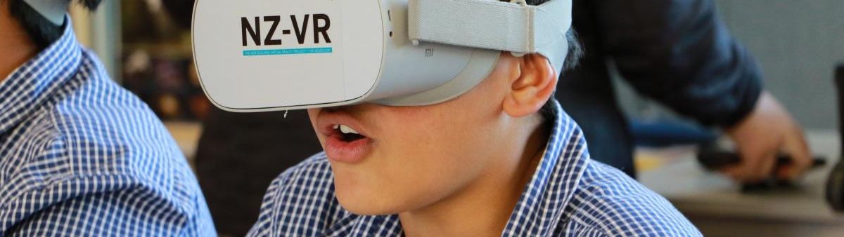 Children using VR headsets.