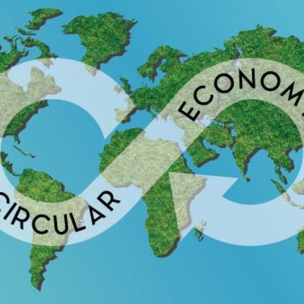 World Map with a Circular Economy graphic projected over it. 
